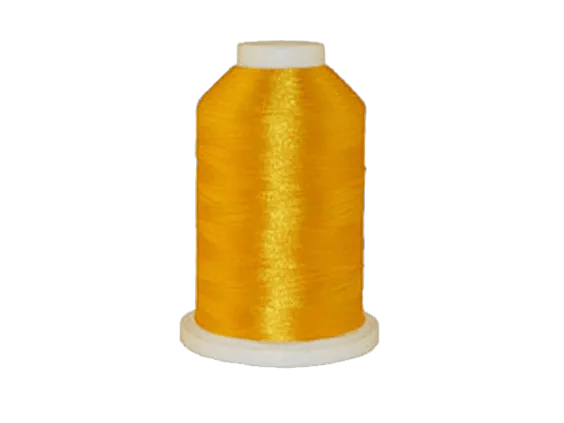 Brother embroidery thread spool in golden yellow with glossy finish on white base