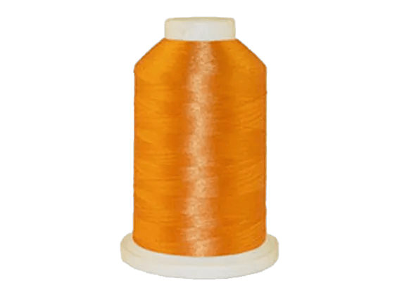 Brother orange embroidery thread spool on white background