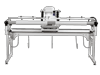 Brother SAQCF100S long-arm quilting machine with automated stitching system on white frame
