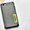 Etiqueta laminada Brother en funda de teléfono junto a cuaderno