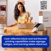 Woman packing box with Brother label printer creating fragile shipping labels on wooden table