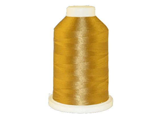 Brother embroidery thread spool in golden yellow on white background