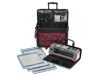 Brother cutting machine with red carrying tote and cutting mats for crafting projects