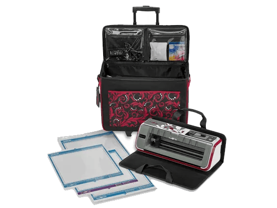 Brother cutting machine with red carrying tote and cutting mats for crafting projects