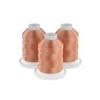 Three spools of peach embroidery thread on white bases