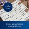 Brother sewing machine custom stitch samples on fabric with thread spools and leather tags