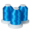 Three spools of bright blue embroidery thread on white bases