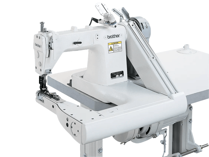 Brother industrial sewing machine with automatic thread trimmer on white frame