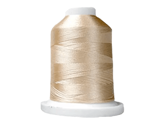 Brother embroidery thread spool in champagne gold with white cap on transparent background