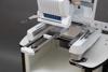 Brother Entrepreneur Pro X embroidery machine with tubular frame attachment for hat embroidery