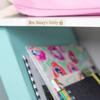 Brother P-touch label on turquoise binder with custom text Mrs. Honey's Cubby