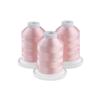 Brother light pink embroidery thread spools on white bases