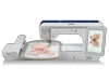 Brother embroidery machine with touchscreen displaying floral design in hoop