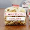 Brother TZe-242 laminated label on gift bag with red gingham ribbon and cookies