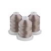 Three spools of Brother embroidery thread in grey-tan on white bases