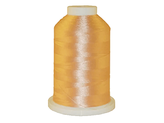 Brother embroidery thread spool in golden yellow with white cap on white base