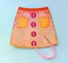Handmade fabric apron craft with orange pockets and pink ribbon ties