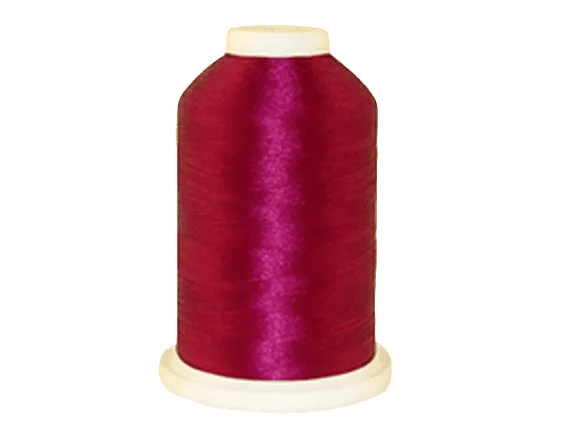 Brother embroidery thread spool in deep red with glossy finish on white background