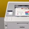 Brother HL-L8245CDW color laser printer with touchscreen displaying cloud service options