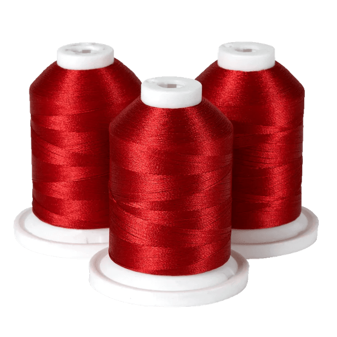 Three spools of red embroidery thread on white bases for Brother sewing machines
