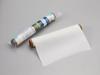 Brother Printmoda heat transfer vinyl roll with sample sheet on gray background