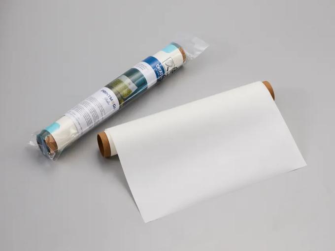 Brother Printmoda heat transfer vinyl roll with sample sheet on gray background