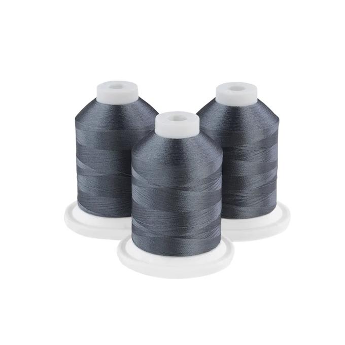 Three gunmetal gray embroidery thread spools on white bases