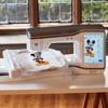 Brother Stellaire XJ2 Disney embroidery machine with Mickey Mouse design on touchscreen