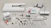 Brother Stellaire Innov-ís XJ2 sewing machine with accessories, presser feet, and operation manual