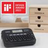 Brother PT-D460BT wireless label maker on coffee bar with labeled wooden organizer drawers