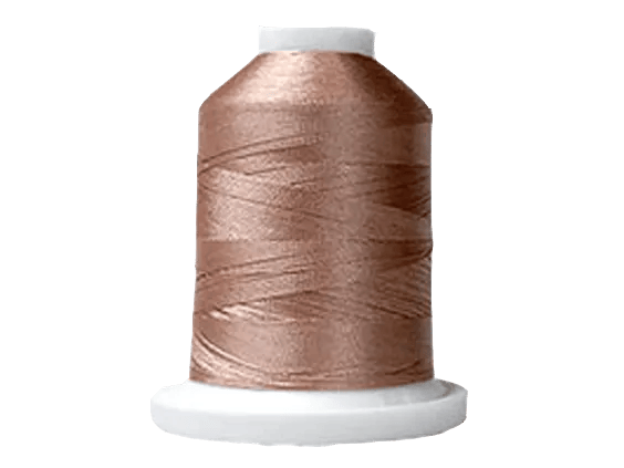 Brother embroidery thread spool in rose gold on white cone