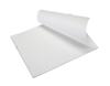 Brother label printer paper roll with perforated sheets on white background