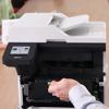 Brother all-in-one laser printer with open toner cartridge compartment
