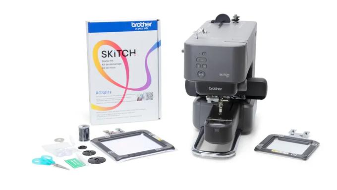 Brother Skitch embroidery machine with accessories and software packaging on white background