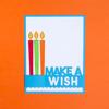 Handmade birthday card with three colorful candles and Make a Wish text