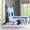Brother Innov-is sewing machine with touchscreen quilting a blue and white geometric quilt