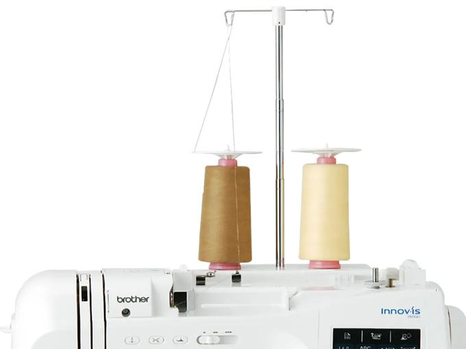 Brother Innov-is sewing machine with dual thread spools and control panel