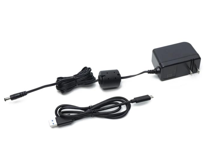 Brother LK-1001C legacy kit with power adapter and USB cable on white background