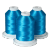 Three spools of bright blue Brother embroidery thread on white bases
