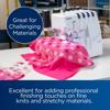 Brother Air1800 serger sewing pink polka dot fabric in home workspace
