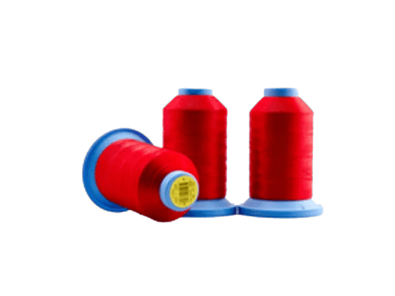 Brother embroidery thread spools in red with blue caps on white background