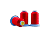 Brother embroidery thread spools in red with blue caps on white background