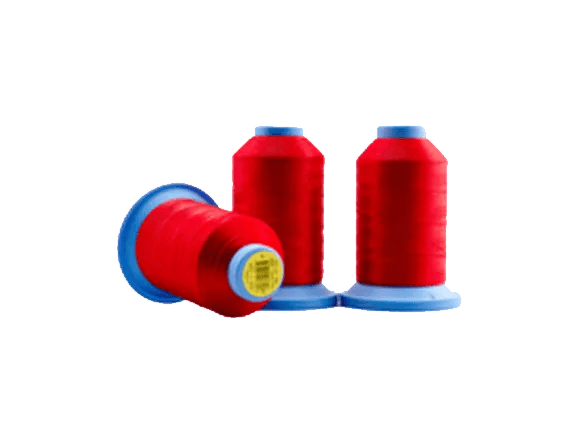 Brother embroidery thread spools in red with blue caps on white background