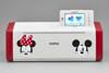 Brother ScanNCut DX cutting machine with Disney Mickey and Minnie Mouse design and touchscreen