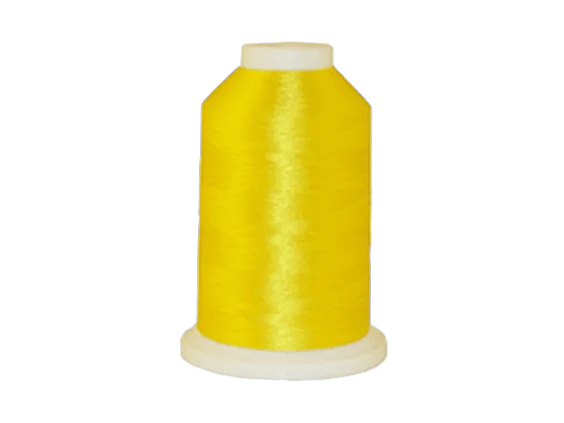 Bright yellow embroidery thread spool with white cap on transparent background