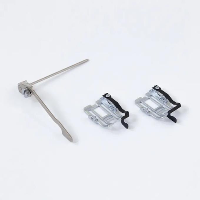 Brother sewing machine accessories including quilting guide and two presser feet