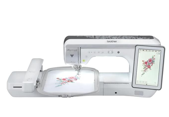 Brother embroidery machine with floral design on fabric and touchscreen display