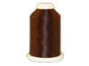 Brown embroidery thread spool on white cone for sewing and stitching projects