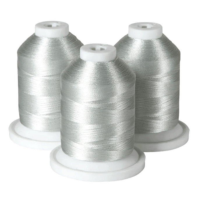 Three silver embroidery thread spools on white bases for Brother sewing machines