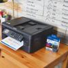 Brother MFC-J1010DW all-in-one wireless inkjet printer with LC401 color ink cartridge pack on desk